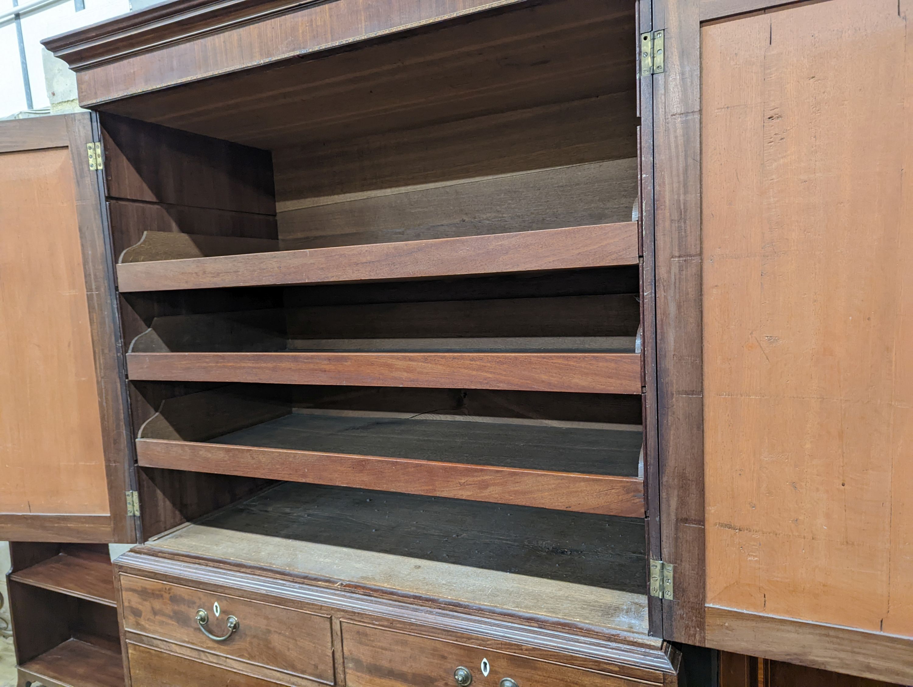 A George III mahogany linen press, length 122cm, depth 59cm, height 203cm